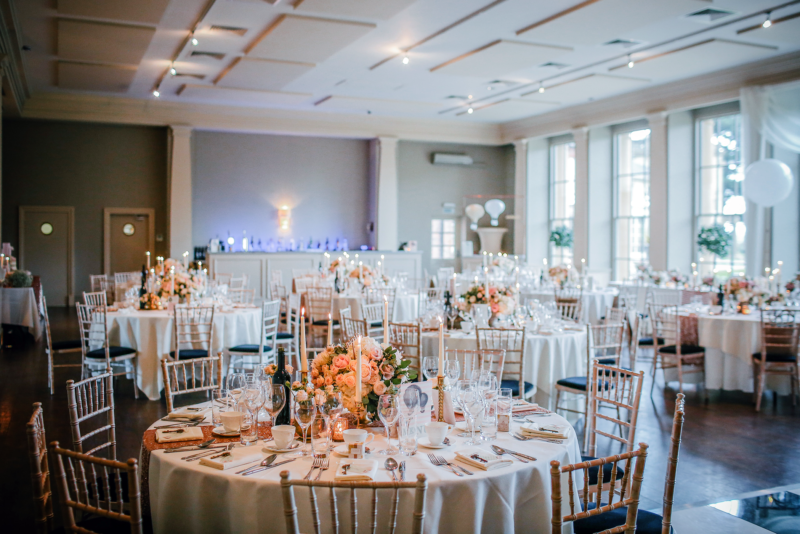elegant wedding reception decorative tables and chairs