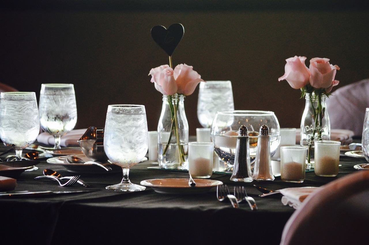 dark and secluded reception with elegant dining table design